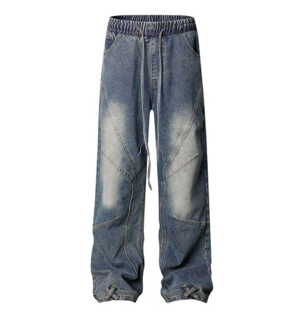 Distressed Pleated Reverse Denim Pants showcasing a washed finish with unique pleated panels and relaxed fit.