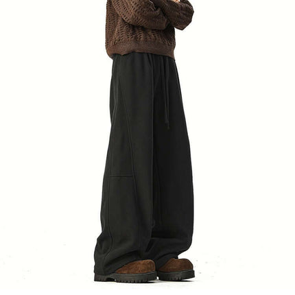 Heavyweight Wide-Leg Pants - Loose Fit displayed with a relaxed sweater and stylish footwear.