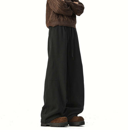 Heavyweight Wide-Leg Pants - Loose Fit displayed with a relaxed sweater and stylish footwear.