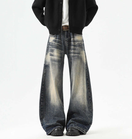 Knife-Edge Denim Trousers – Loose Fit showcasing knife-edged seam detailing with a washed distressed finish.