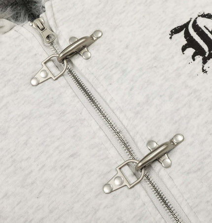 Close-up of the zipper detail on a Velvet Hooded Jacket - Loose Fit with a stylish graphic design.