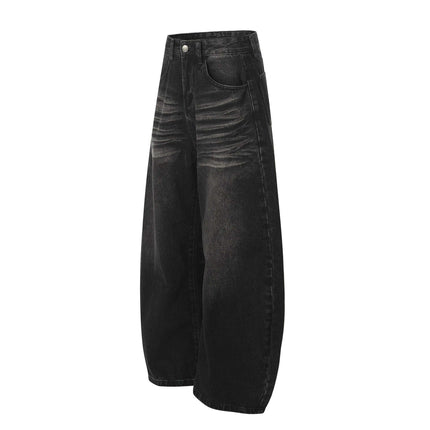 Washed Black Vintage Knife Cut Jeans with relaxed fit and cat whisker fade detail.
