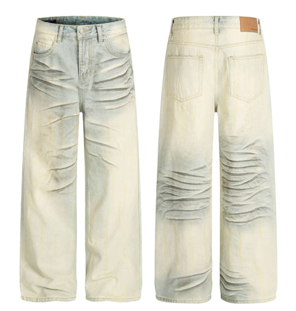 Vintage Cat-Scratch Denim Pants showcasing a classic whisker wash effect and loose fit silhouette.