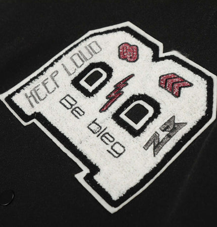 Heavy Embroidery Baseball Jacket – Thick Fit with bold 'KEEP LOUD' patch detail on black fabric.