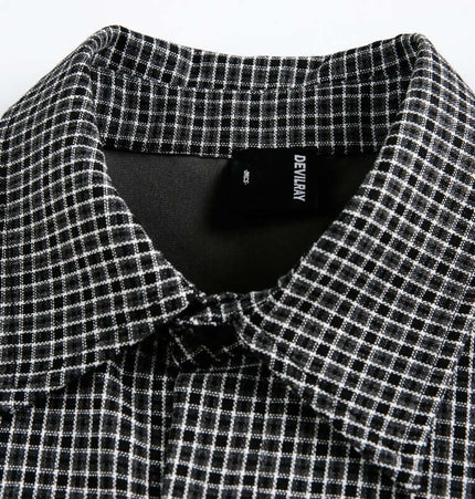 Checkered Patchwork Shirt - Loose Fit close-up, showcasing collar and black and white grid pattern.