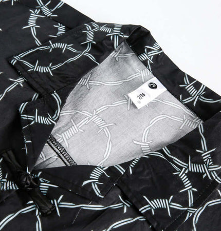 Striped Short Sleeve Shirt - Loose Fit collar and inner label close-up showcasing bold stripe patterns