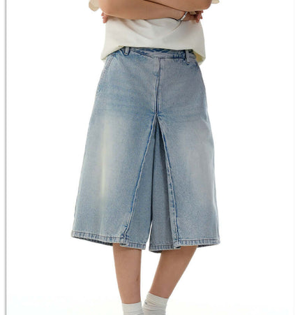 Washed Blue Denim Shorts – Loose Fit displayed on model, showcasing a relaxed summer fit and vintage-inspired style.