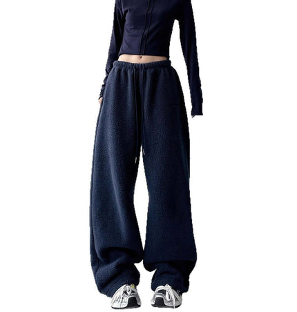 Sherpa Fleece Straight Pants - Loose Fit worn by model, showcasing urban-style comfort in plush fleece.