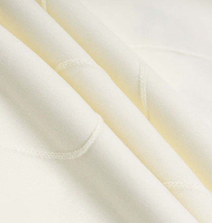 Embroidered Letter Hoodie – Loose Fit fabric close-up showing soft texture and premium quality.