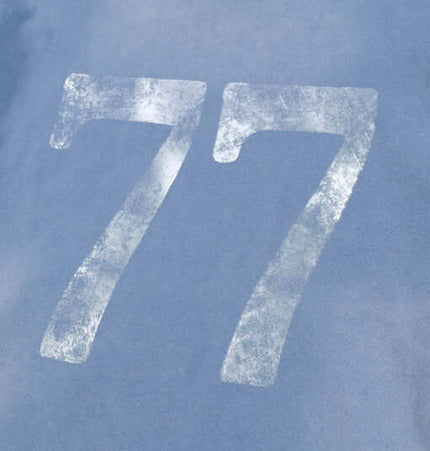 Washed Rhinestone Letter Hoodie – Loose Fit showing the back design with a faded number 77.