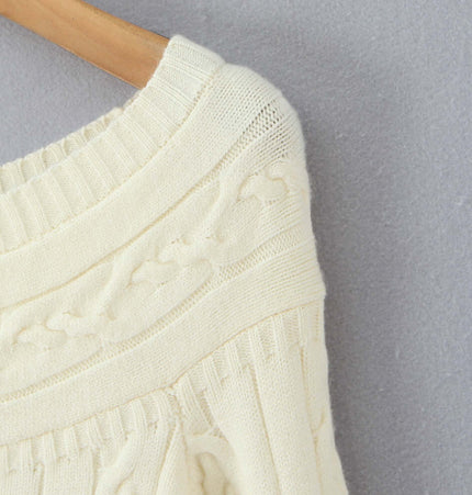 Close-up of the Grozavu Off-Shoulder Twists Slim Knit Sweater showcasing the soft, textured fabric.