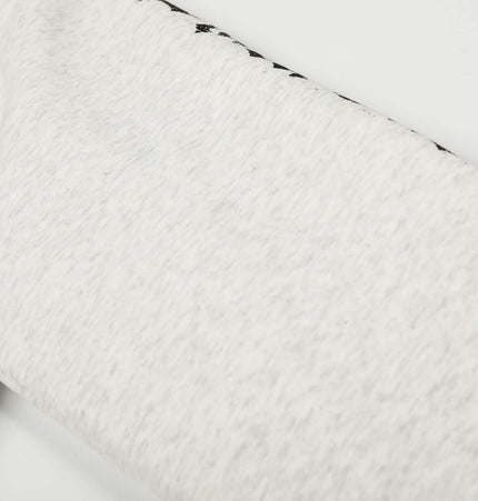 Detail of the sleeve on the Velvet Hooded Jacket - Loose Fit showcasing soft fabric and unique design.