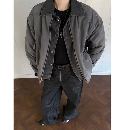 Person wearing Workwear Cotton Jacket - Loose Fit with casual jeans and stylish shoes.