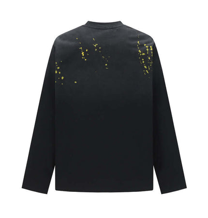 Ripped Gradient Long Sleeve TShirt showcasing the back view with a black fabric and abstract yellow splatter design.