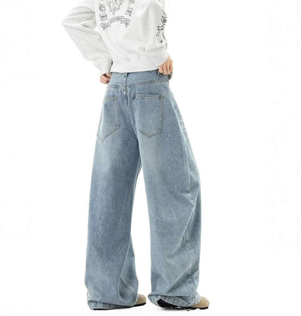 Washed Letter Print Jeans - Loose Fit showcasing a model wearing wide-leg distressed denim pants from the back.