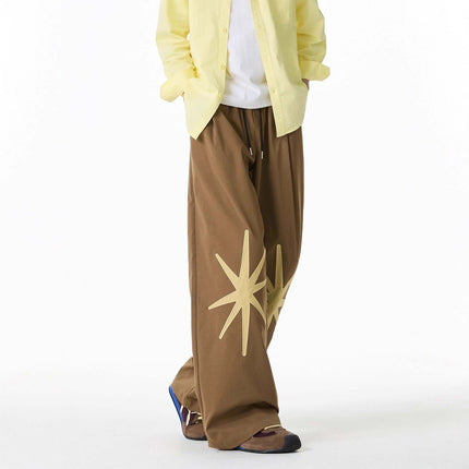 Back view of Black patterned technical trousers by Grozavu