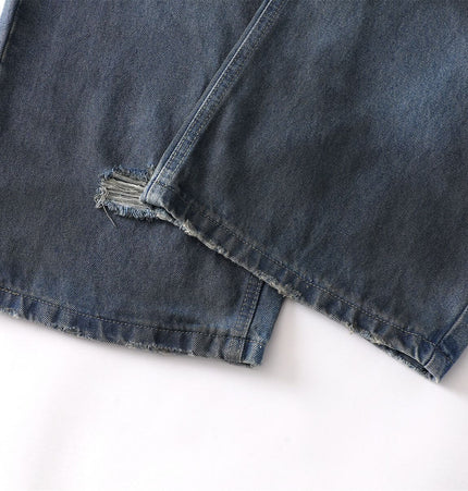 Washed Distressed Denim Pants showing the hem and distressed detailing for a casual street-style look.