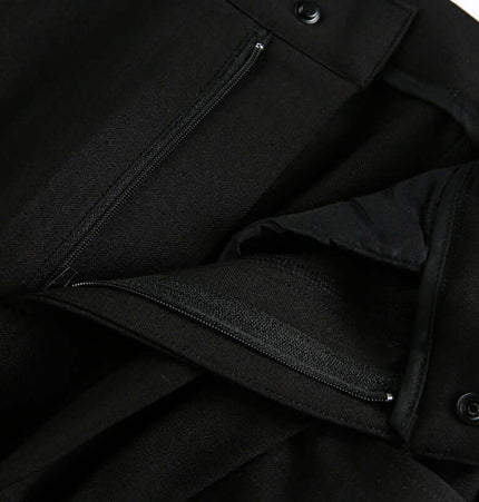 Close-up of the zipper details on the Wide Leg Pleated Plaid Trousers, showcasing the quality and craftsmanship.