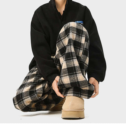 Fleece-Lined Winter Pants - Loose Fit worn by a person in black top and checkered pants, perfect for winter layering.