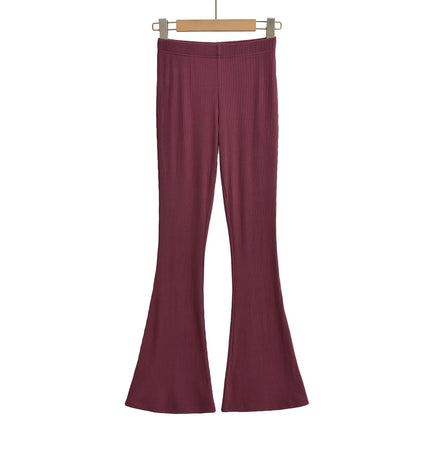Slim Fit Low Waist Slightly Flared Pants in a rich burgundy color, featuring a sleek and comfortable design.