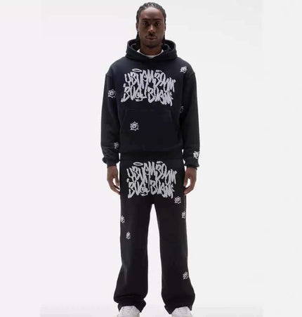 Printed Top and Long Pants – Street Fit worn by model, featuring bold urban design and relaxed fit.