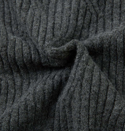 Close-up of soft, textured fabric for Ripped Hem Knit Cardigan – Loose Fit, showcasing the ribbed knit pattern.
