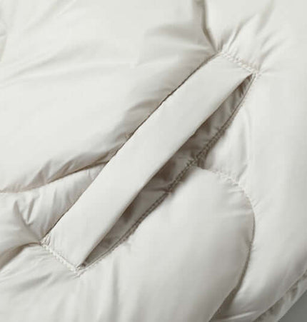 Close-up of the Wave Design Puffer Coat – Loose Fit showcasing its plush texture and unique wave pattern.