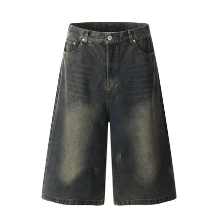 Model wearing Blue distressed denim three quarter trousers by Grozavu