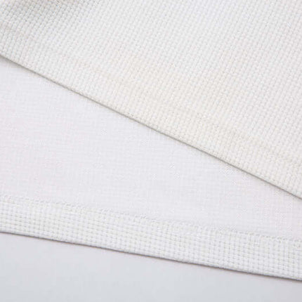 Close-up of the fabric texture of Casual Loose Waffle Knit Top in soft cotton blend.