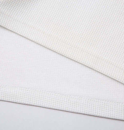 Close-up of the fabric texture of Casual Loose Waffle Knit Top in soft cotton blend.