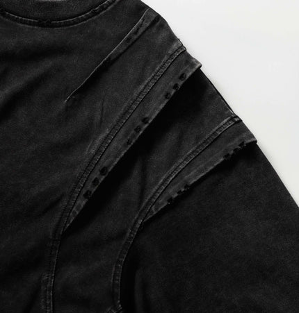Washed Spliced Distressed TShirt – Loose Fit black detail showcasing splicing and distressed design.