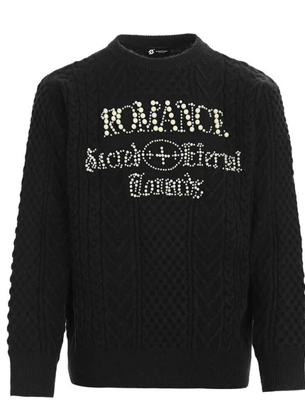 Model wearing Apricot letter embellished round neck sweater by Grozavu