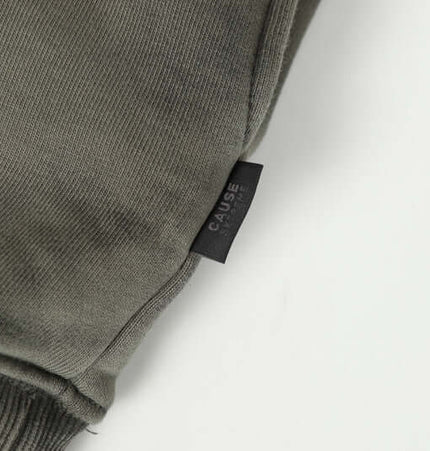 Stripe Patchwork Hoodie – Loose Fit close-up detail showing fabric texture and label.