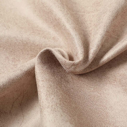 Close-up of soft beige fabric, showcasing texture used in the Faux Fur Hooded Jacket – Street Style.