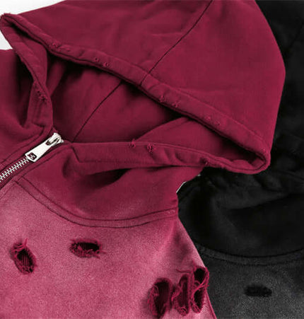 Half-Zip Printed Hoodie – Loose Fit featuring a maroon and black design with distressed details and a half-zip front.