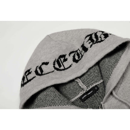 Letter Jacquard Knit Hoodie – Loose Fit showcasing bold lettering on soft gray fabric with intricate knit details.