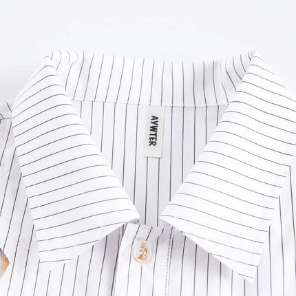 Close-up of the collar of the Flame Lace Patchwork Shirt – Loose Fit featuring striped detailing and a button.