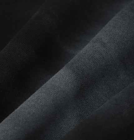 Close-up of soft cotton blend fabric used in Creative Vintage Hoodie – Loose Fit, showcasing its texture and quality.