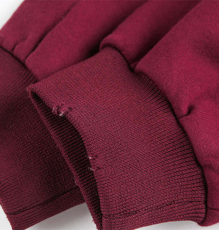 Close-up of the sleeve cuffs of the Tie-Dye Gradient Half-Zip Hoodie – Loose Fit, showcasing the distressed details.