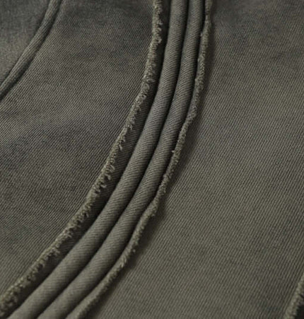 Close-up of the Stripe Patchwork Hoodie – Loose Fit showcasing detailed stitching and patchwork design.