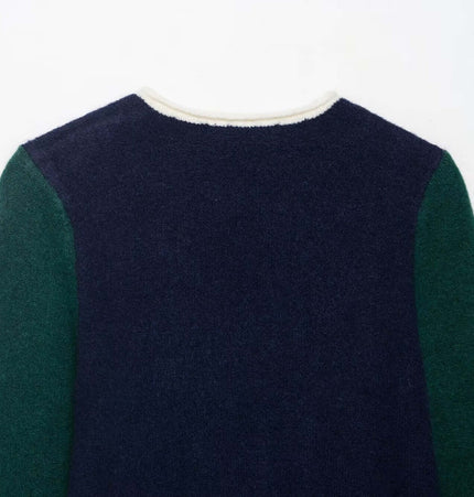 Back view of the Color Block Patchwork Knit Sweater showcasing its unique color design and soft texture.