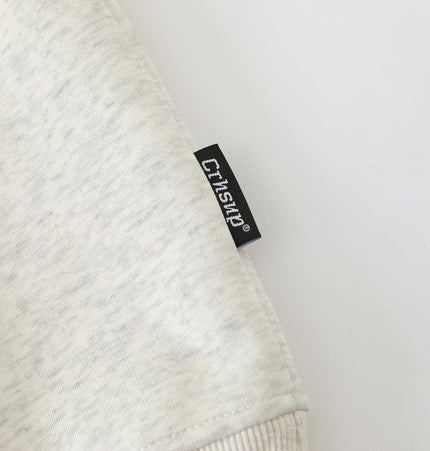 Slanted Shoulder Retro Graffiti Hoodie close-up of fabric and label, showcasing the unique design and quality.