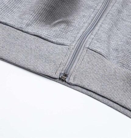 Distressed Letter Zip Hoodie - Loose Fit close-up showing zipper and fabric texture.