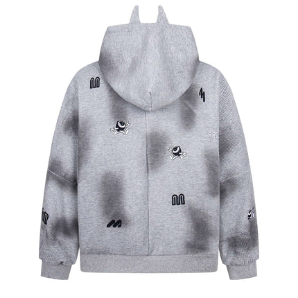 Distressed Letter Zip Hoodie - Loose Fit in grey with embroidered designs and playful details on the back.