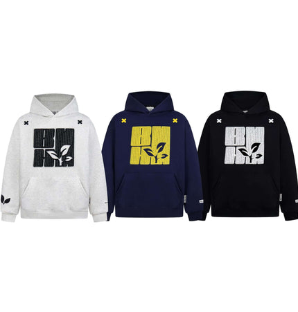 Cross Embroidered Hoodie – Loose Fit in three colors: gray, navy, and black featuring a distinct embroidered design.