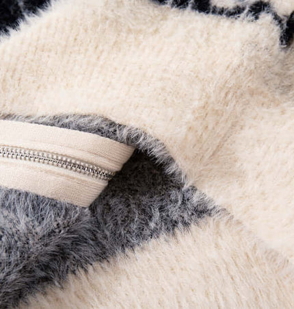 Detail of the Floral Jacquard Knit Cardigan – Loose Fit showing soft fabric and zipper closure