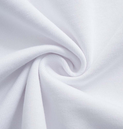 Close-up of white cotton fabric showcasing softness and texture for the Retro Washed Face Letter TShirt – Loose Fit.