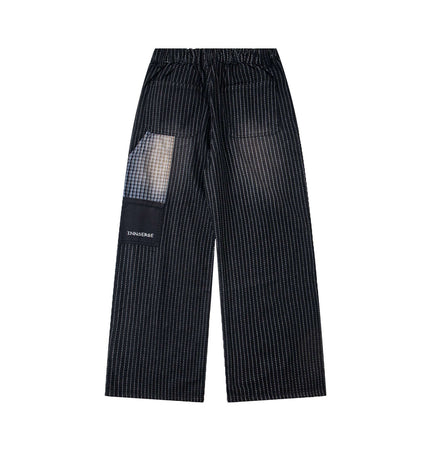 Retro Striped Embroidery Trousers - Loose Fit showcasing a stylish wide-leg design with unique patchwork.