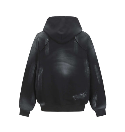 Creative Vintage Hoodie – Loose Fit showcasing a black hoodie with artistic brushstroke designs on the back.