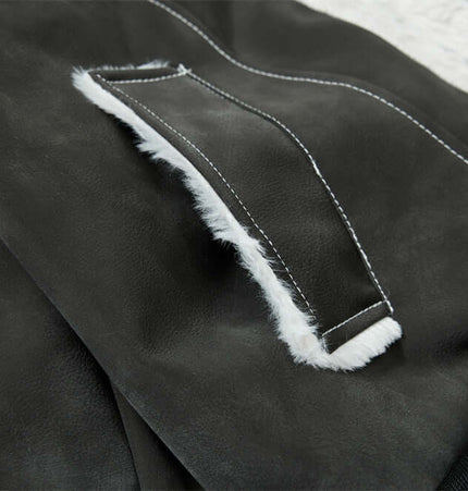 Close-up of the Street Style Cotton Jacket – Loose Fit, showcasing the PU leather paneling and ribbed hem details.